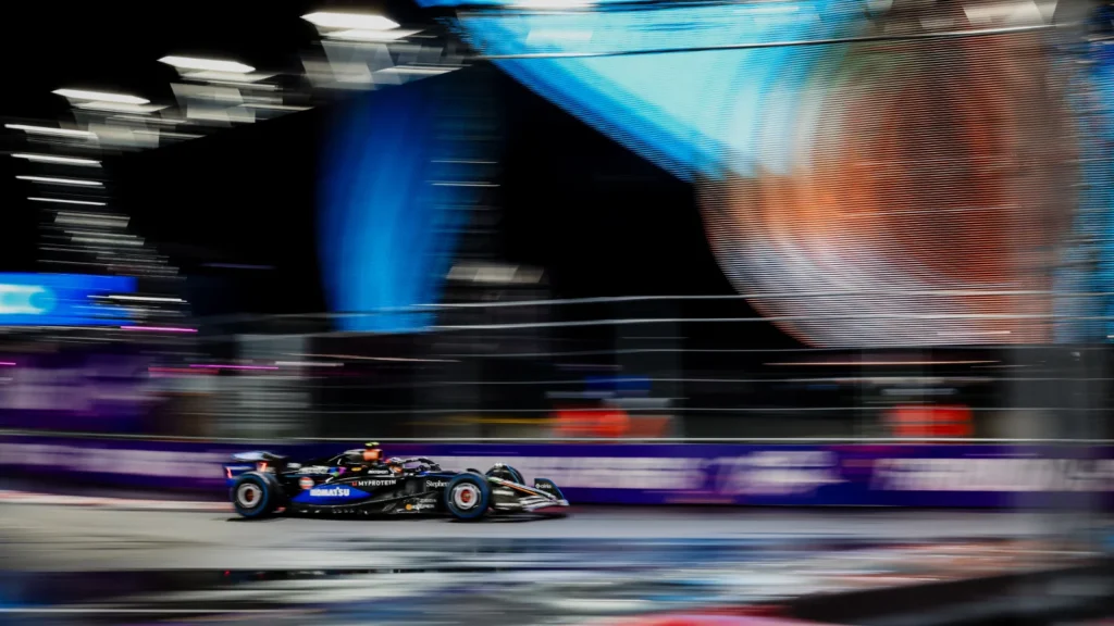 Carlos Sainz navigated the wet Las Vegas circuit to take third