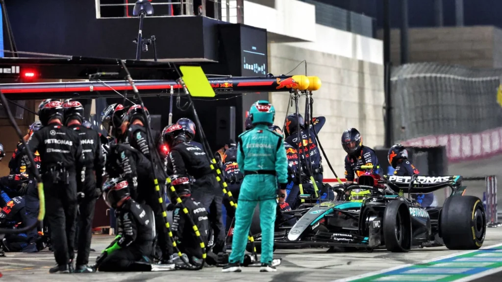 Lewis Hamilton pulling into the pits with a puncture to his Pirelli tyres, at the 2024 Qatar Grand Prix.