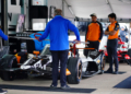 Cars undergoing a portion of required technical inspection ahead of track running. Photo: Kevin Dejewski