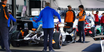 Cars undergoing a portion of required technical inspection ahead of track running. Photo: Kevin Dejewski