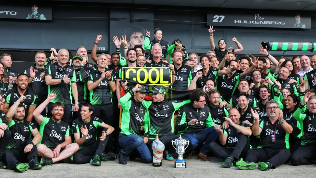 Nico Hulkenberg, Gabriel Bortoleto, and the Sauber team celebrating their podium at the 2025 F1 British GP. 