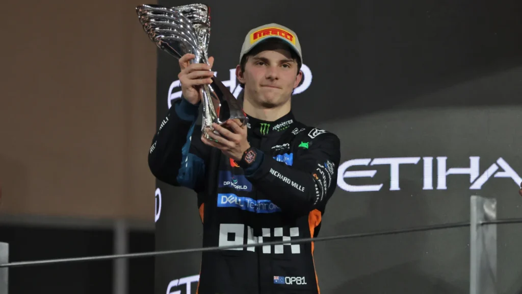 Oscar Piastri (AUS) McLaren celebrates his second position on the podium. 07.12.2025. Formula 1 World Championship, Rd 24, Abu Dhabi Grand Prix, Yas Marina Circuit, Abu Dhabi, Race Day.