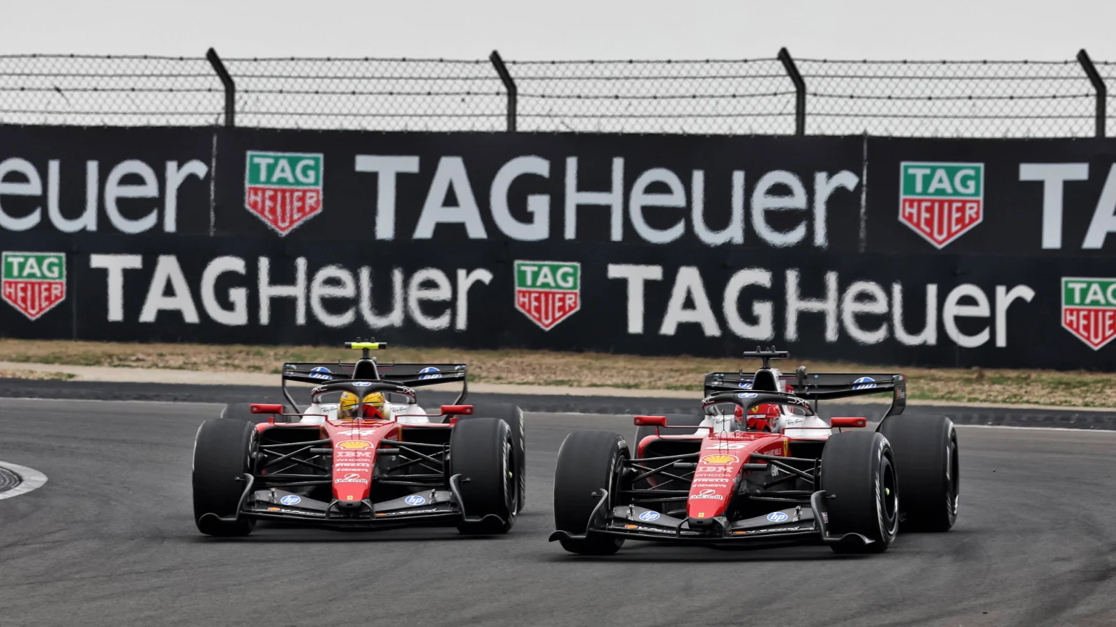 Lewis Hamilton (GBR) Scuderia Ferrari SF-26 and Charles Leclerc (MON) Scuderia Ferrari SF-26 battle for position. 15.03.2026. Formula 1 World Championship, Rd 2, Chinese Grand Prix, Shanghai, China, Race Day.