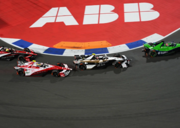 JEDDAH, SAUDI ARABIA - FEBRUARY 14: Antonio Felix da Costa of Portugal driving the (13) Jaguar TCS Racing Jaguar I-TYPE 7 leads Oliver Rowland of Great Britain driving the (1) Nissan Formula E Team Nissan e-4ORCE 05 on track during the Jeddah E-Prix, Round 5 of the 2026 FIA Formula E World Championship at Jeddah Corniche Circuit on February 14, 2026 in Jeddah, Saudi Arabia.