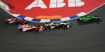JEDDAH, SAUDI ARABIA - FEBRUARY 14: Antonio Felix da Costa of Portugal driving the (13) Jaguar TCS Racing Jaguar I-TYPE 7 leads Oliver Rowland of Great Britain driving the (1) Nissan Formula E Team Nissan e-4ORCE 05 on track during the Jeddah E-Prix, Round 5 of the 2026 FIA Formula E World Championship at Jeddah Corniche Circuit on February 14, 2026 in Jeddah, Saudi Arabia.