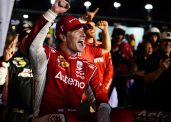 Newgarden celebrated his victory while sitting on the side of his car. Photo: Kevin Dejewski