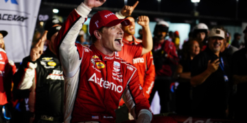 Newgarden celebrated his victory while sitting on the side of his car. Photo: Kevin Dejewski