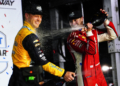 Newgarden and Rasmussen celebrate together on the podium. Photo: Kevin Dejewski