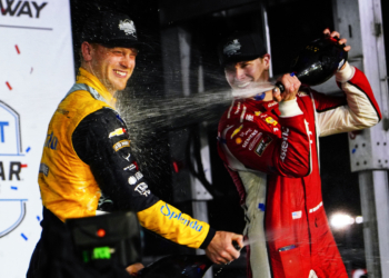 Newgarden and Rasmussen celebrate together on the podium. Photo: Kevin Dejewski