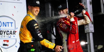 Newgarden and Rasmussen celebrate together on the podium. Photo: Kevin Dejewski
