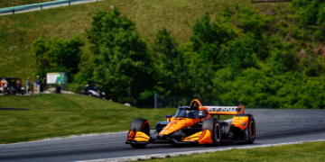 O'Ward speeds through the final turn with hills in the background. Photo: Kevin Dejewski
