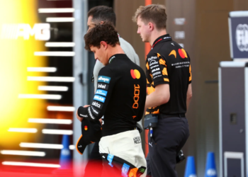 Lando Norris walks away after his F1 Monaco GP retirement