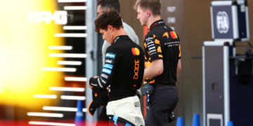Lando Norris walks away after his F1 Monaco GP retirement