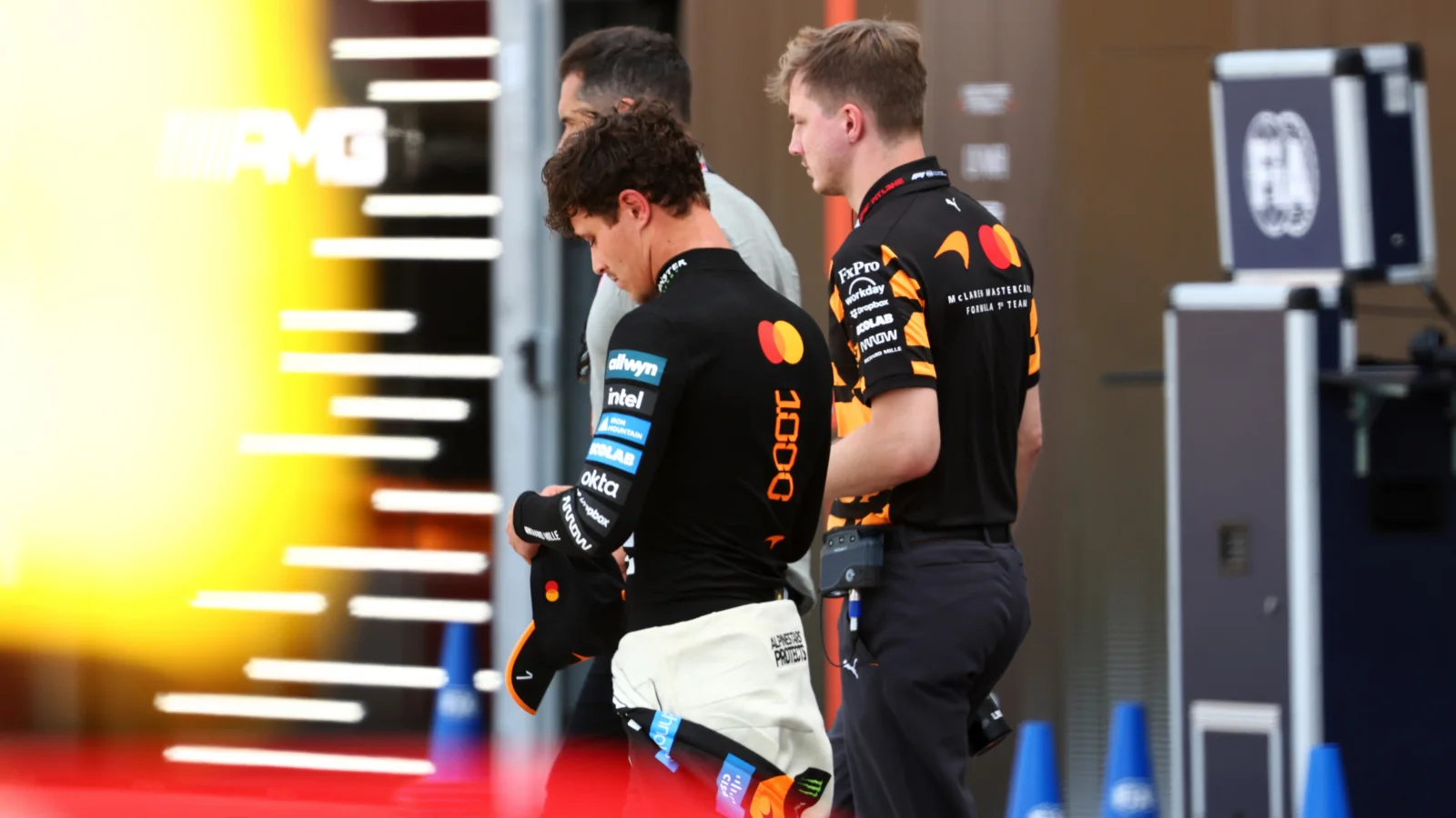 Lando Norris walks away after his F1 Monaco GP retirement