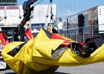 Malukas' car was brought back to the paddock with a cloth underneath to contain fluids. Photo: Kevin Dejewski