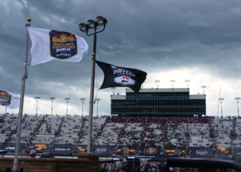 Dark clouds and lightning approach the speedway. Photo: Kevin Dejewski