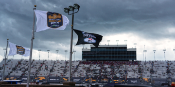 Dark clouds and lightning approach the speedway. Photo: Kevin Dejewski