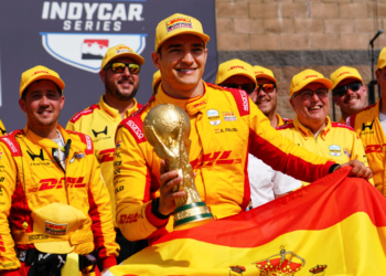 Palou celebrates with a replica World Cup trophy in victory lane. Photo: Kevin Dejewski