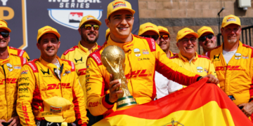 Palou celebrates with a replica World Cup trophy in victory lane. Photo: Kevin Dejewski