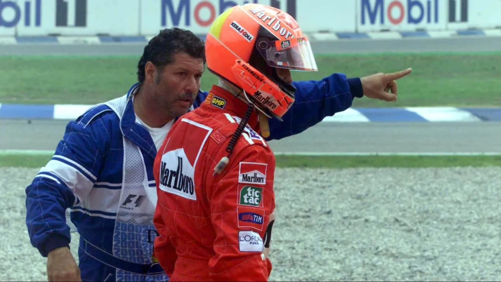 Michael Schumacher was out at the first corner after contact with Fisichella