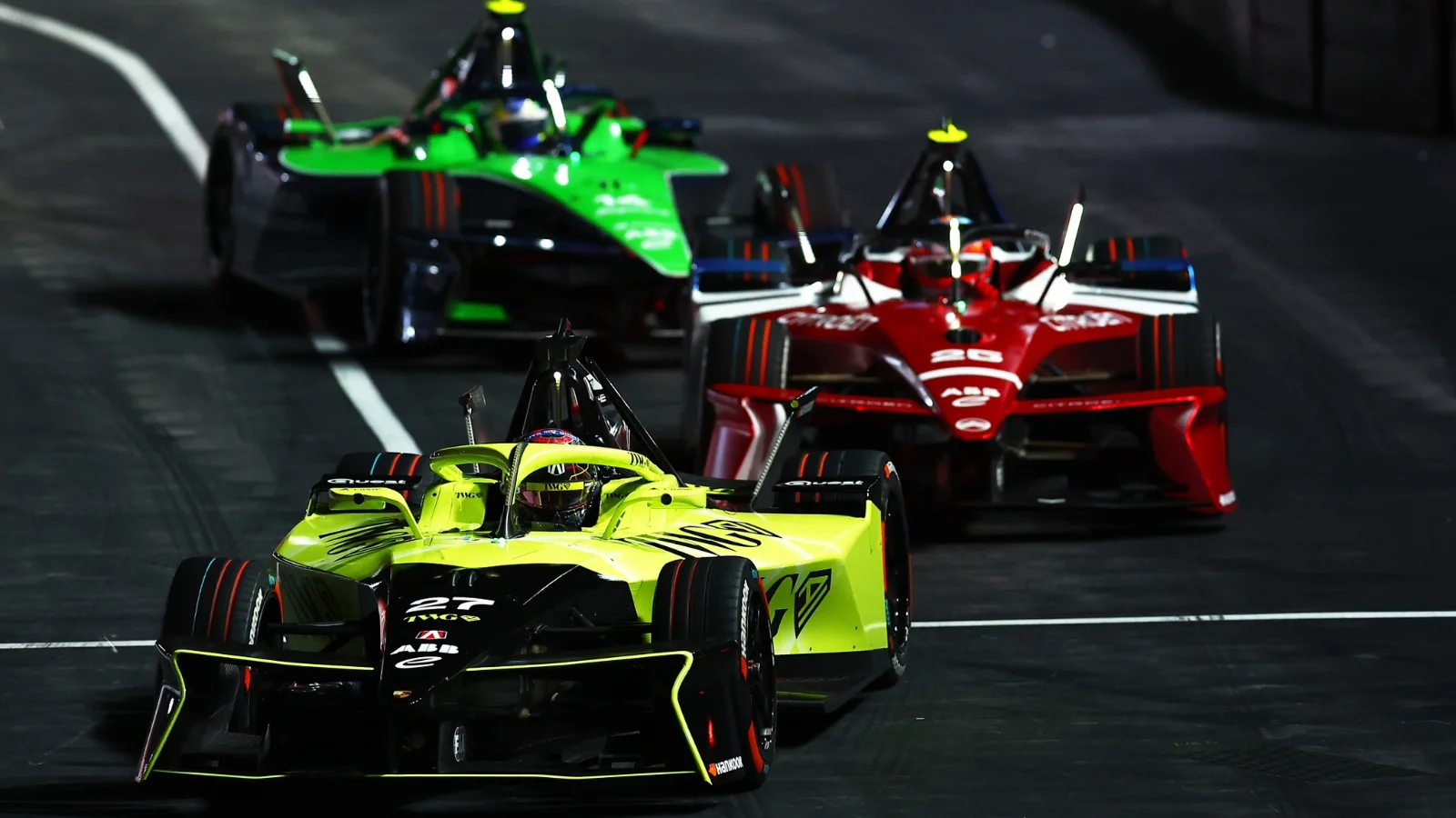 LONDON, ENGLAND - AUGUST 15: Jake Dennis of Great Britain driving the (27) Andretti Formula E Porsche 99X Electric leads Jean-Eric Vergne of France driving the (25) Citroen Racing e-CX during the London E-Prix, Round 16 of the 2026 FIA Formula E World Championship at ExCel London on August 15, 2026 in London, England.