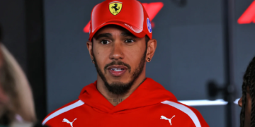 Lewis Hamilton has revealed how he coped with bullying in his junior years