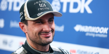 TOKYO, JAPAN - JULY 26: Mitch Evans of New Zealand and Jaguar TCS Racing talks to the media during qualifying, ahead of the Tokyo E-Prix, Round 15 of the 2026 FIA Formula E World Championship at Tokyo Street Circuit on July 26, 2026 in Tokyo, Japan.