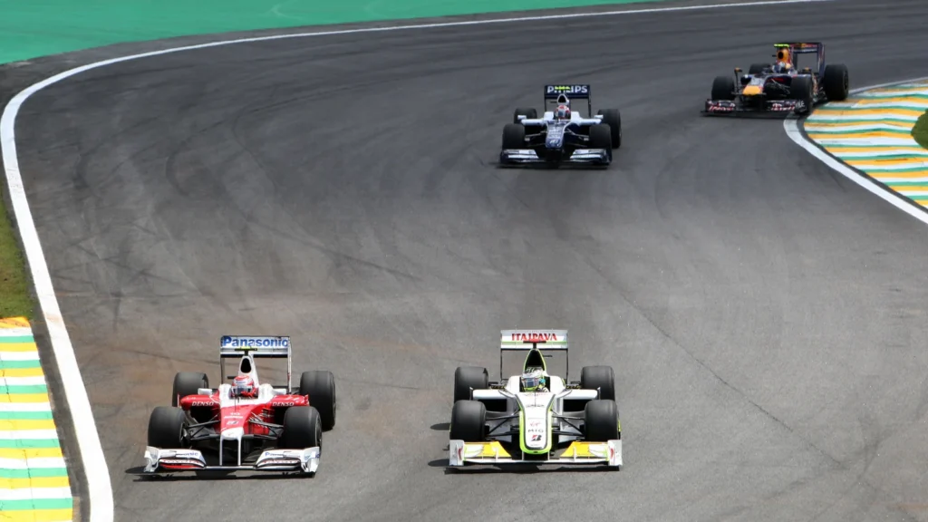 Jenson Button worked his way through the pack, but found Kamui Kobayashi's resistence stern