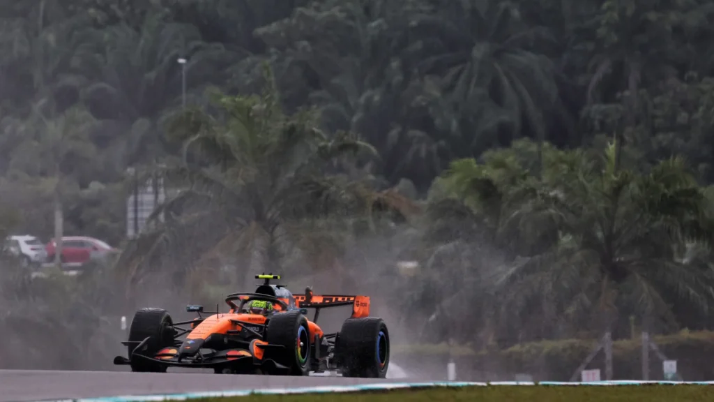 Lando Norris was forced to return to the pit after the formation lap amid the software glitch that caused several cars to slow