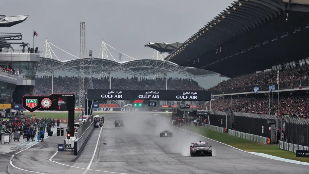 The Safety Car leads the field before chaos...