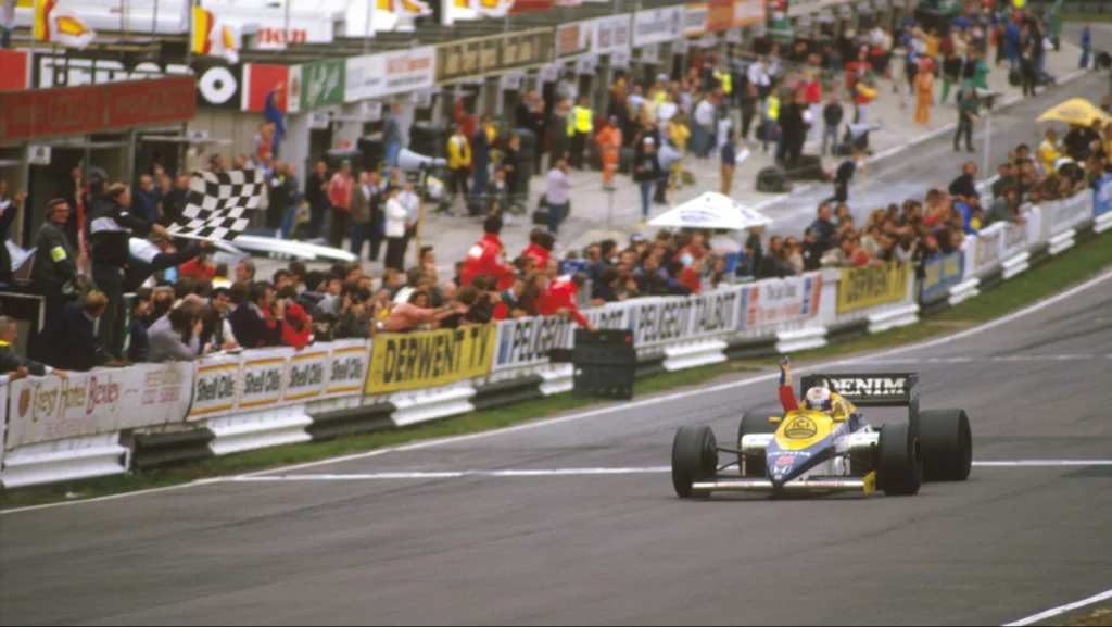"He is exultant, he is exubertant, and he's got every justification to be!" Nigel Mansell takes the first Grand Prix of his career at Brands Hatch, 1985