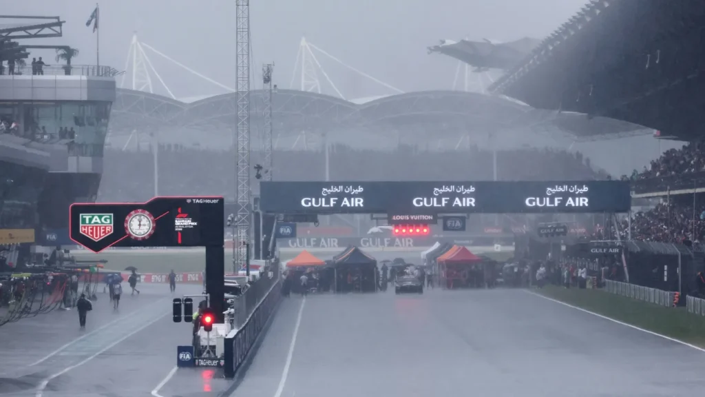 The race start at Sepang has been delayed due to heavy rain