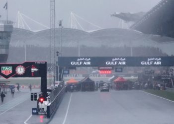 The race start at Sepang has been delayed due to heavy rain