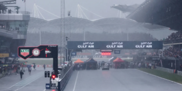 The race start at Sepang has been delayed due to heavy rain